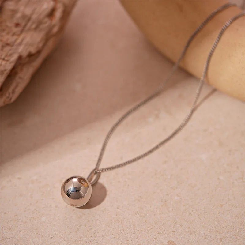Pendentif-sphère-métallique-de-luxe-en-acier-inoxydable-pour-femmes