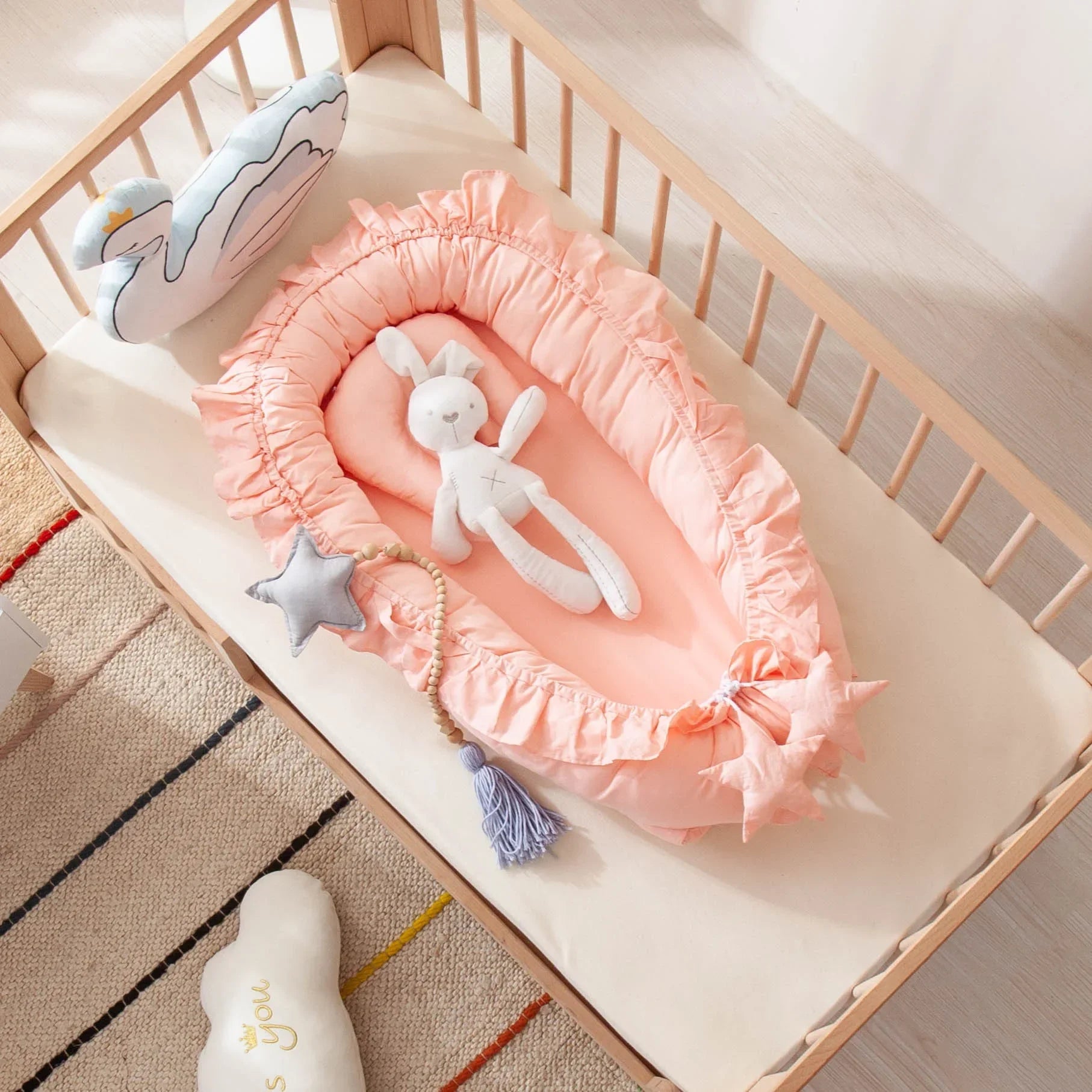 Nid-de-couchage-berceau-bebe