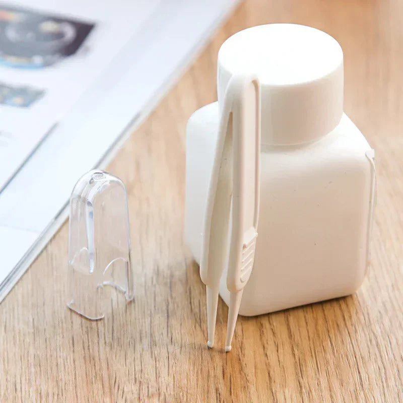 Pince à épiler en plastique